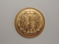 A United Kingdom Royal Mint 2002 Queen Elizabeth II Gold Shield Back Sovereign