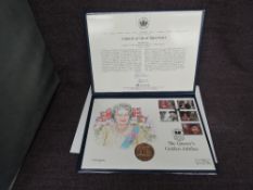 A Queen Elizabeth II Royal Mint 2002 Gold 1oz 5 Pound Coin on large hand painted Queen Golden