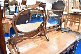 Two late 19th or early 20th century mahogany toilet mirrors
