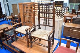 A 19th Century vernacular spindle back chair having rush seat