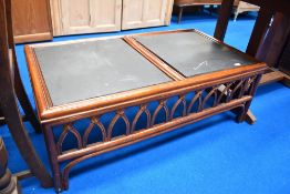 A wicker and slate conservatory style coffee table