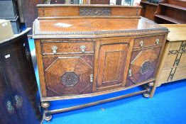 A late 19th or early 20th Century oak sideboard, width approx. 136cm