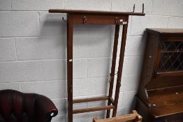 A hall stand frame with wall mounting bracket