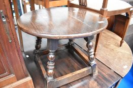 An early to mid 20th Century oak coffee table, diameter approx. 50cm