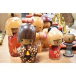 Ten vintage and modern Japanese wooden Kokeshi dolls hand crafted and decorated.