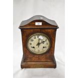 An early 20th century bracket style mantel clock of military interest with oak case and presentation