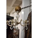 A vintage five branch chandelier with cut glass lustre drops.