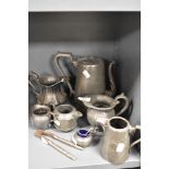 A selection of antique pewter tea wares including J.H Potter and Craftsman.