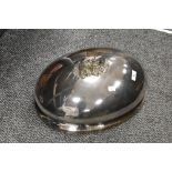 A late Victorian silver plated cloche dome lid having acanthus leaf decorated handle. 40cm long by