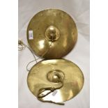 A pair of early 20th century musical cymbals.