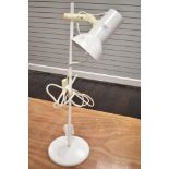 A vintage mid century style adjustable lamp.