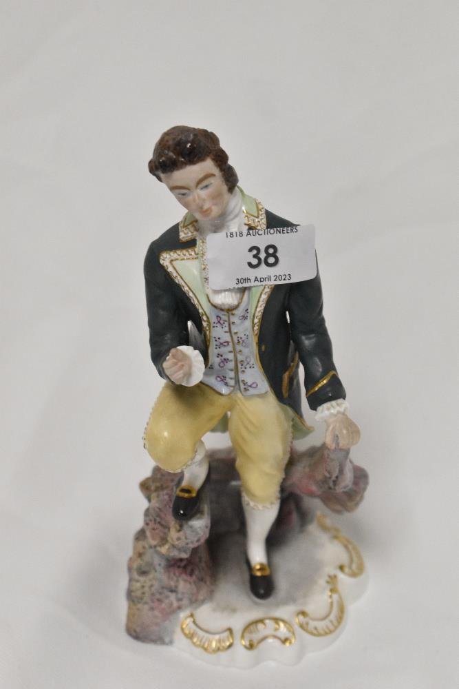 A Royal Crown Derby figure study of Beau Brummell.