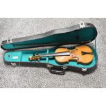 A traditional violin, of small proportions (child size) , unlabelled two piece back of approx. 11