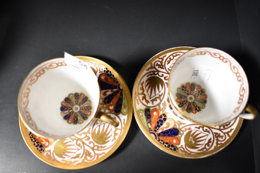 A pair of Copeland tea cup and saucer sets having an Imari palette pattern. - Image 4 of 5