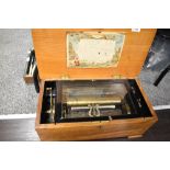 A 19th Century mahogany cased music box , 12 airs