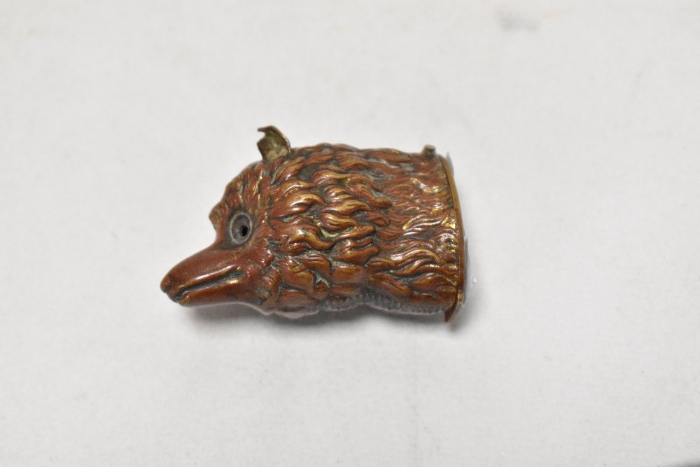 A 19th century patinated copper fox head vesta case, AF.