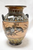 A large Lambeth Doulton aysthetic period vase, circa late 1880s, having Bird decoration to body on
