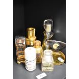 A selection of vintage ladies perfume bottles with contents, Yves Saint Laurent, Boss and Paul