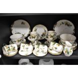 A Victorian porcelain part tea service being decorated with an Ivy leaf and gilt design.