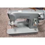 A vintage Singer Sewing machine model 285K.