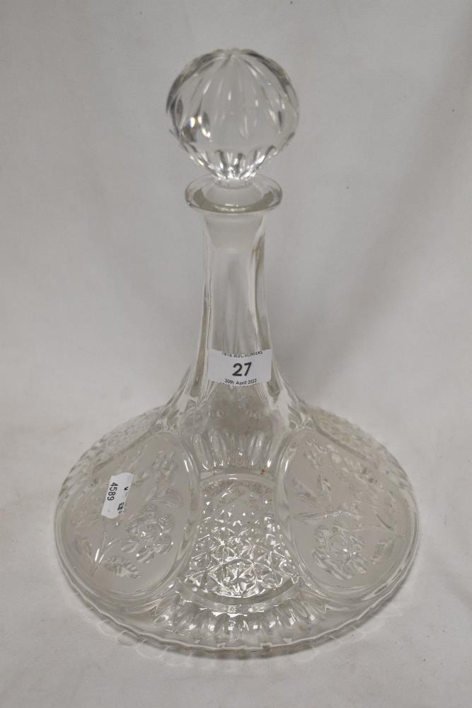 A 20th century glass decanter in a ships design.