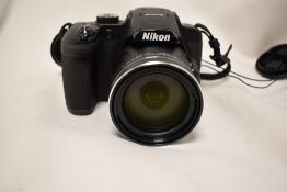 A Nikon Coolpix B700 with Nikkor 60x wide optical lens 4,3-258 1:3,3-6,6 lens
