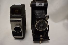 A Bell & Howell cine camera and a Kodak six 20 Junior folding camera
