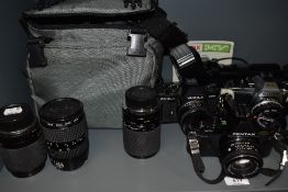 Three cameras and lenses. A Pentax MV with Pentax 1:2 50mm lens, a Yashica FX-3 Super with Yashica