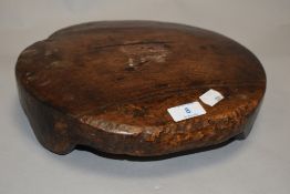 An antique treen farm house or cottage low stool or stand, having good patina.