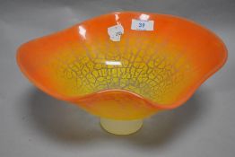A modern art glass bowl having orange to yellow crackle fade with frosted foot. indistinctly