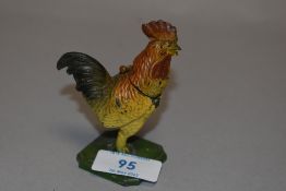 An early 20th century vesta or match case in the form of a Rooster.