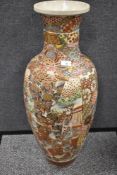 A large early 20th century Japanese floor standing vase decorated with enamels and scenes of