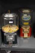 Two mid century sweet dispensers including one by Beaver Brand with key.