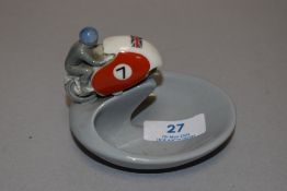 A mid century Wade ashtray in the form of an Isle Of Man TT Motorcycle.