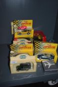 A selection of modern die cast model cars including Maisto and Promotors.