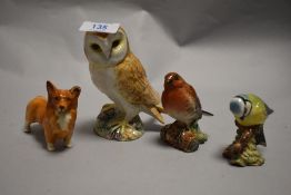 Four Beswick animal studies including Barn Owl, Corgi dog and Blue tit.