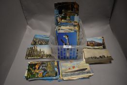 A collection of 20th century and later postcards including some earlier black and white examples.
