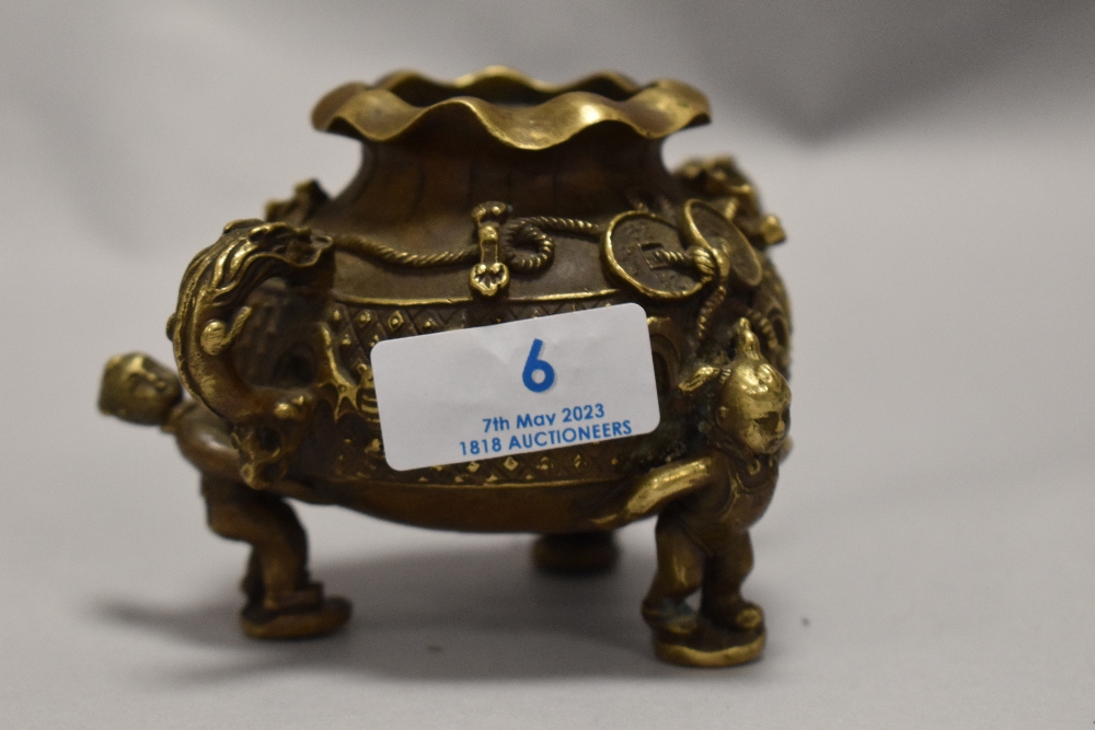 An antique Chinese cast bronze censor or Koro in the form of a lucky money pot on tripod base as - Image 6 of 6