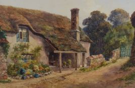 Lewis Mortimer, (19th/20th century), a watercolour, thatched country cottage, signed and dated 1920,