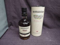 A bottle of Edradour 10 Year Distillery Edition Single Highland Malt Scotch Whisky, 40% vol, 70cl,