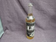 A bottle of LB Latvia Whisky, The label reads: this whisky is the first one produced in Latvia. It