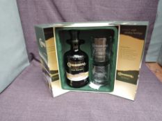 A bottle of Connemara Peated Single Malt Irish Whiskey, 70cl, 40% vol with two glasses in card