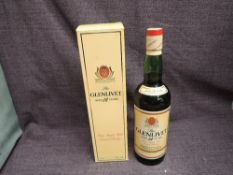 A bottle of Glenlivet 12 Year Old Pure Single Malt Scotch Whisky, 40% vol, 75cl, in card box with