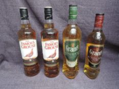 Four bottles of Blended Scotch Whisky, The Famous Grouse x2 40% vol, 70cl, Grants 40% vol, 50cl