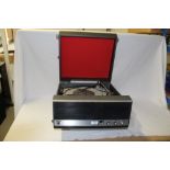 A portable record player by Bush - does need some TLC but has a great vintage 1960's look to it -