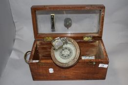 A cased Henry Brownie & Son Ltd 'Sestrel' compass, marked 'Made in England' the mahogany case with