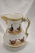 A vintage jug in the Victorian style, having hand painted Cock fighting scenes, green banding and