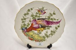 A Victorian plate, having hand painted golden pheasant design to centre.