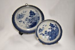 Two 18th century Chinese export shallow bowls, having willow variant pattern, AF.