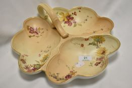 A Royal Worcester blush ivory serving dish, having three compartments and handles, dated to 1897.